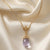 Clear Glass Egg Pendant Necklace by 1928 Jewelry