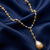 Large Faux Pearl Teardrop Y Pendant Necklace by 1928 Jewelry