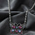 Light Sapphire And Amethyst Crystal Butterfly Pendant Necklace by 1928 Jewelry