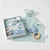 Misty Blue Muslin Comforter And Teething Ring by Jiggle & Giggle