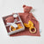 Rosette Muslin Comforter And Teething Ring by Jiggle & Giggle