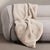 Carlson Bone Faux Fur Throw by Sheridan