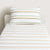 Skwiggle White Fitted Sheet And Pillowcase Set by Sheridan Junior