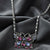 Light Sapphire And Amethyst Crystal Butterfly Pendant Necklace