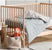 Smiles All Round SUGAR SMOKE Cot Coverlet (100 x 120cm)